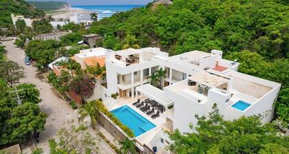 Rooftop Plunge Pool & Surf-Friendly Beach