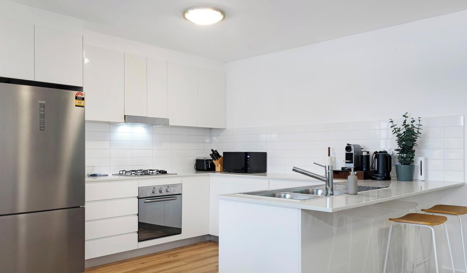 Coffee/tea maker, fridge, microwave, oven