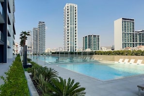 Pool - Skyline-View 1BR with Balcony,Minutes to Downtown and Marina, Binghatti Onyx, JVC (Dubai)