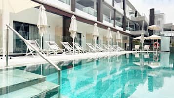 2 outdoor pools, pool umbrellas, pool loungers