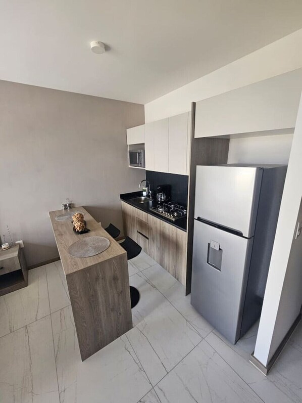 Fridge, microwave, oven, stovetop