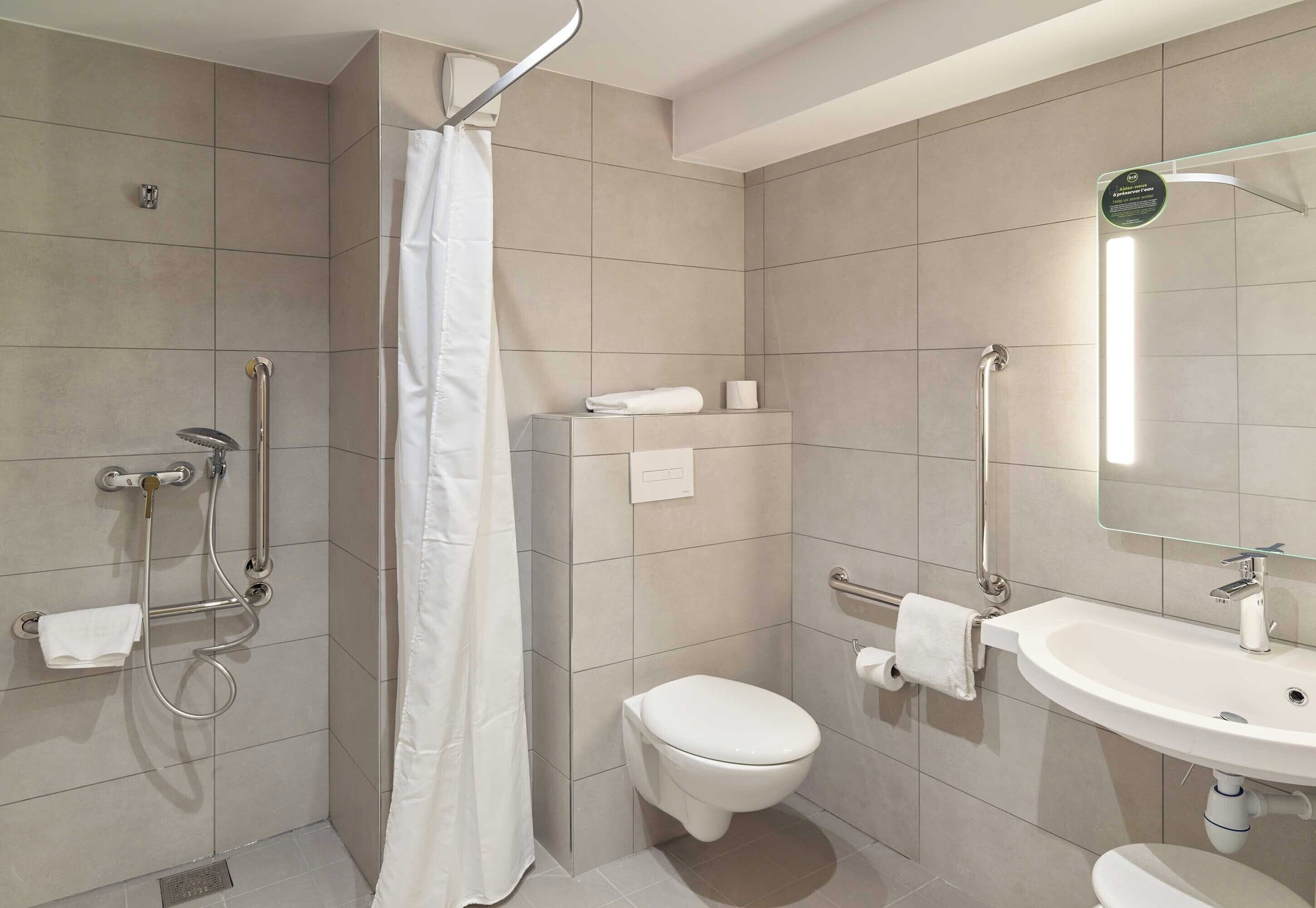 Double Room, Accessible, Non Smoking | Bathroom | Shower, hair dryer, towels, soap