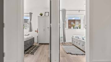 2 dormitorios, tabla de planchar con plancha, wifi gratis y ropa de cama