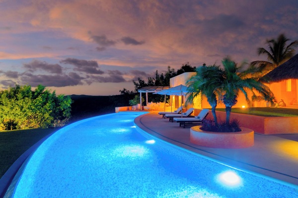 We invite you to experience the tranquil beauty of our pool at night!