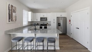 Fridge, dining tables - Landing | Incredible 2BD, Pool, Courtyard (Madison)