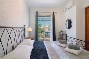 2 dormitorios, tabla de planchar con plancha, wifi gratis y ropa de cama