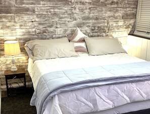 1 bedroom, desk, iron/ironing board, travel cot