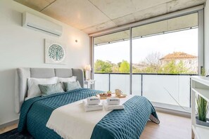 Iron/ironing board, travel crib, free WiFi, bed sheets