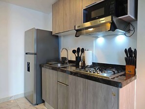 Fridge, microwave, oven, stovetop