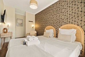 2 habitaciones, escritorio, tabla de planchar con plancha y wifi gratis 