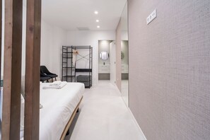 Iron/ironing board, travel crib, free WiFi, bed sheets