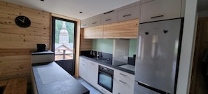 Coffee/tea maker, fridge, microwave, oven