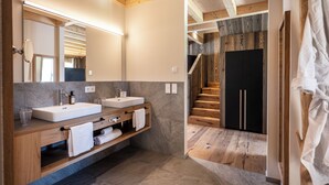 A modern bathroom with two sinks, wooden vanity, and a large mirror. - Kessler's Mountain Lodge (Naz Sciaves)