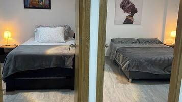 2 dormitorios, tabla de planchar con plancha, wifi y ropa de cama