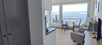 Modern apartment with a wonderful direct view of the dune and North Sea