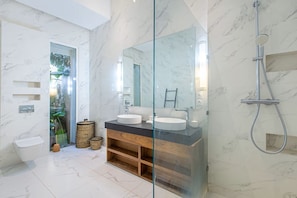 Shower, hair dryer, towels, soap