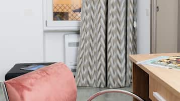Deluxe Double Room | Minibar, in-room safe, individually decorated, desk