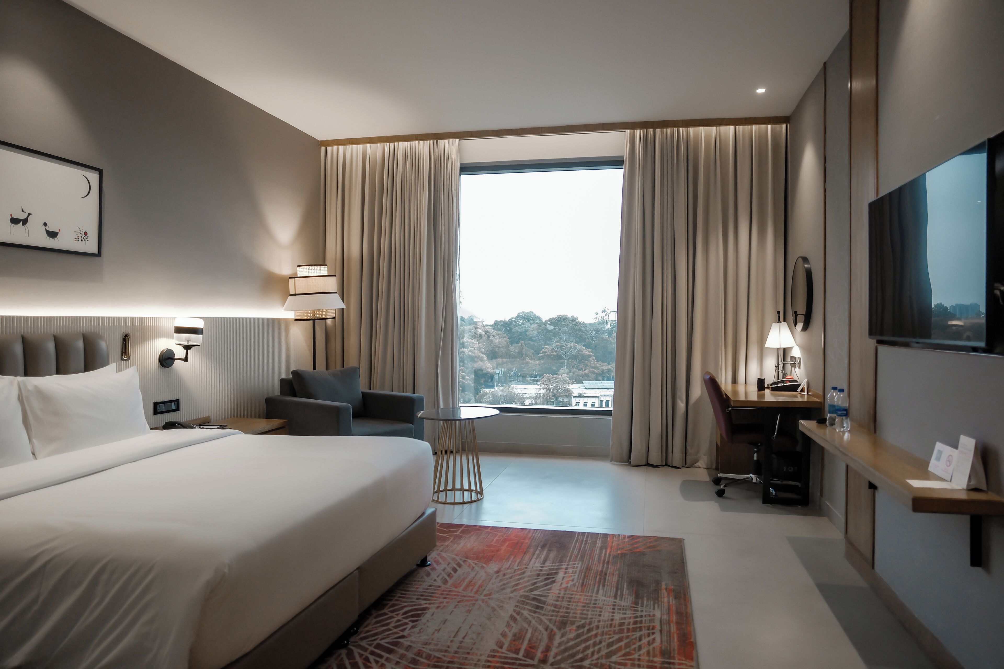 Premium bedding, down comforters, memory foam beds, minibar