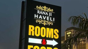 A sign for RANAJI HAVELI indicating rooms and food services. - Rana Ji Haveli (Najibabad)