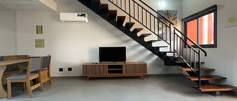 Superior Duplex | Living area | 32-inch flat-screen TV with digital channels