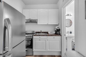 Fridge, microwave, dishwasher, coffee/tea maker