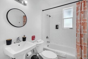 Hair dryer, towels, soap, shampoo