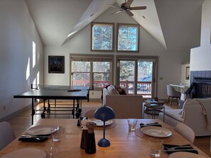 Smart TV, fireplace, books, computer monitors