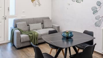Comfort Apartment, 1 King Bed with Sofa bed, Non Smoking | Living area | 55-inch Smart TV with satellite channels, Netflix, smart speakers