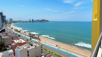 Deluxe Apartment, Balcony, Beach View | Beach/ocean view