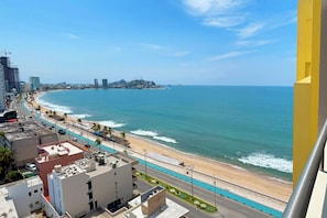 Deluxe Apartment, Balcony, Beach View | Beach/ocean view