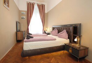 1 chambre, fer et planche à repasser, Wi-Fi gratuit, draps fournis