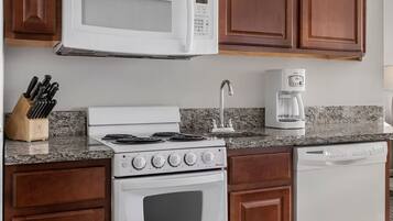 Condo, 1 King Bed with Sofa bed, Non Smoking, Kitchen | Private kitchen | Full-sized fridge, microwave, oven, stovetop