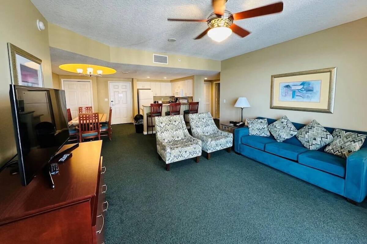 Suite, 3 Bedrooms, Non Smoking, Kitchen | Living area | 60-inch flat-screen TV with cable channels, DVD player, pay films