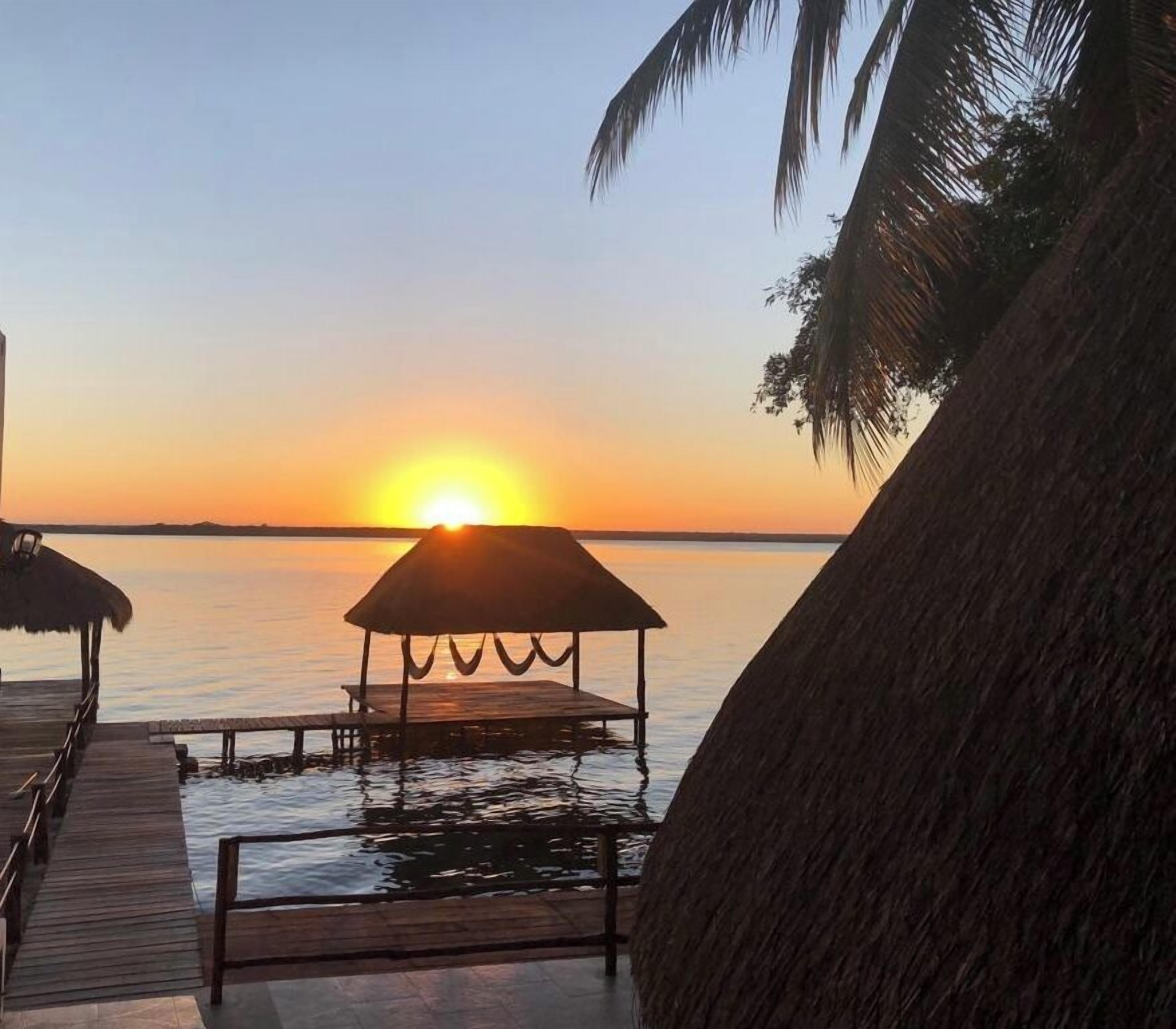 On the beach, white sand, beach towels, beach massages