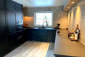 Microwave, oven, stovetop, dishwasher - Seaside villa in Umeå with wood-fired sauna perfect for families and companies (Unknown)