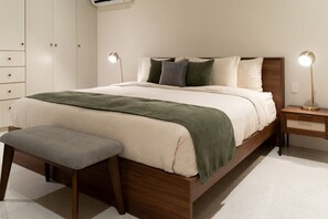 1 bedroom, desk, iron/ironing board, travel crib