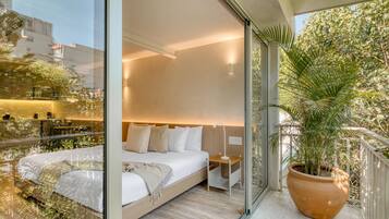 1 bedroom, desk, iron/ironing board, travel crib