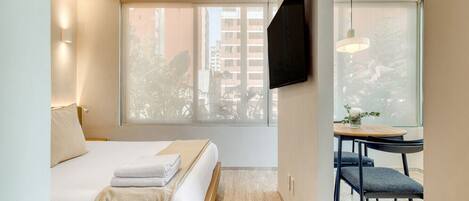 1 bedroom, desk, iron/ironing board, travel crib