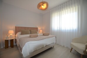 2 slaapkamers, een strijkplank/strijkijzer, gratis wifi, beddengoed