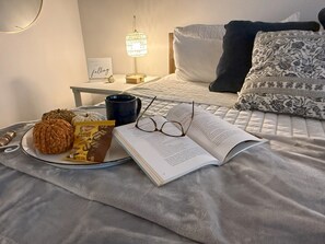 1 bedroom, desk, iron/ironing board, travel crib