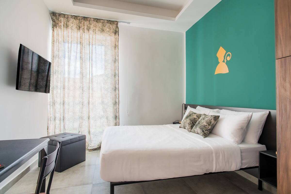 Deluxe Double Room, Balcony, City View | 1 bedroom, minibar, in-room safe, blackout drapes