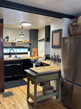 Microwave, oven, stovetop. Charming 2-bedroom house in welcoming Saint Johnsbury with WiFi, AC