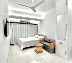 Iron/ironing board, free WiFi - 375 sqft 3 cozy Studio with Pool & Gym (Dhaka)