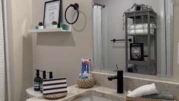 Hair dryer, towels, soap, toilet paper