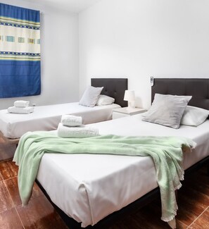 3 dormitorios, tabla de planchar con plancha, wifi gratis y ropa de cama
