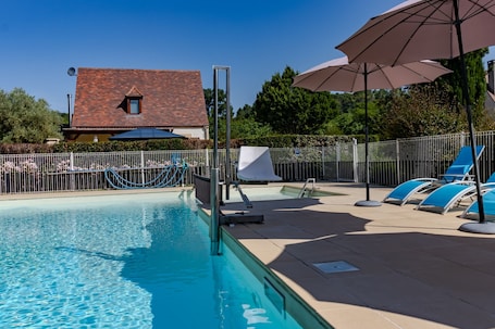 Indoor pool, a heated pool. Holiday Home 'Fleurie' with Shared Pool, Wi-Fi & Air Conditioning