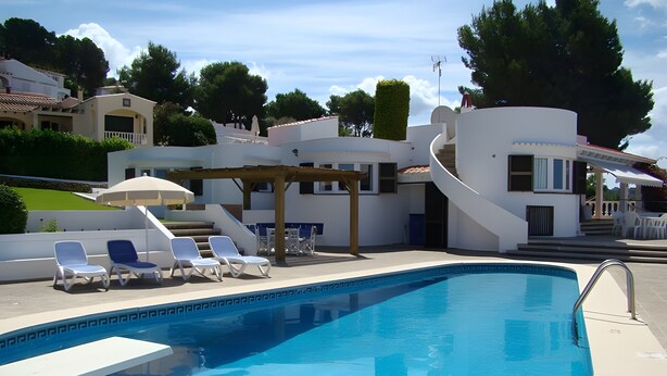 A swimming pool with lounge chairs, a pergola, and a staircase leading to a covered area. - Villa 'V206  Isabel' with Sea View, Wi-Fi and Air Conditioning (San Jaime Mediterráneo)