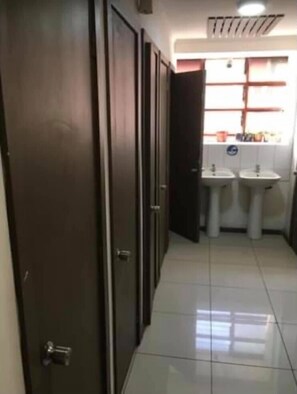 Shower, towels, soap, toilet paper