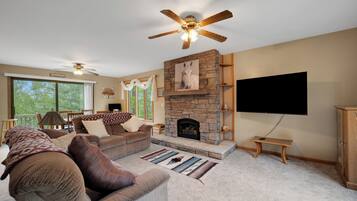 Smart TV, fireplace, books, offices