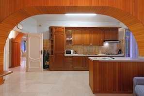 Fridge, microwave, cookware/dishes/utensils